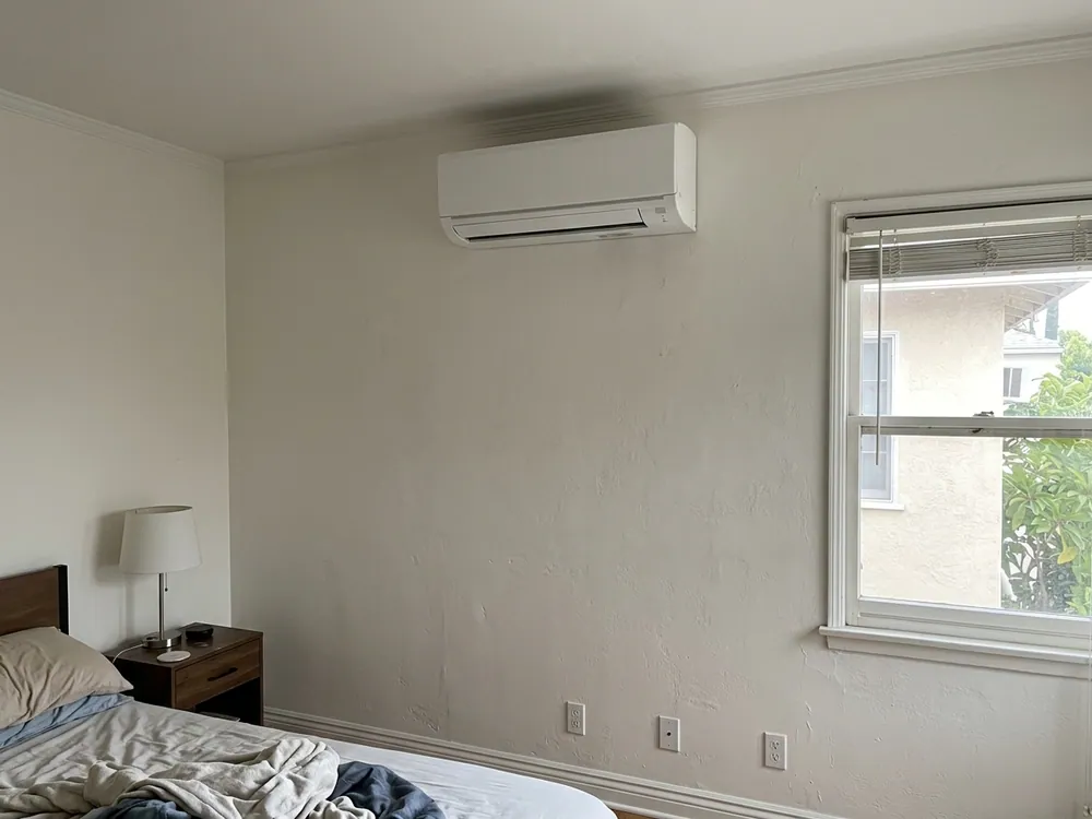 Indoor mini-split above a bedroom.